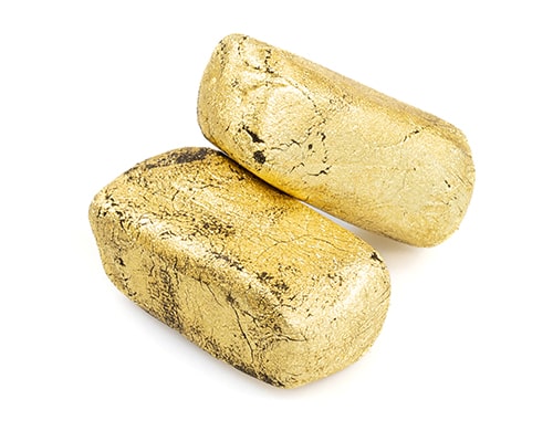 due pezzi di hashish legale colore oro afghan gold